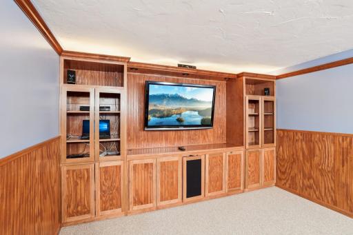 Movie night is a breeze with a main floor theater room or could easily be converted to a main floor bedroom.