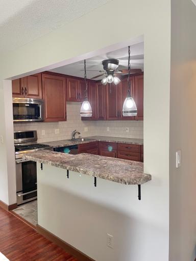 This wall was opened and breakfast counter added!