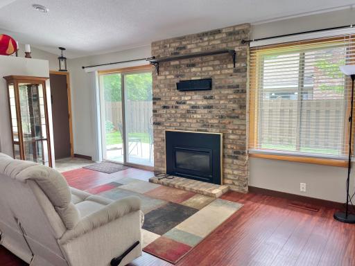 Lots of natural light and gas fireplace in this spacious living room!