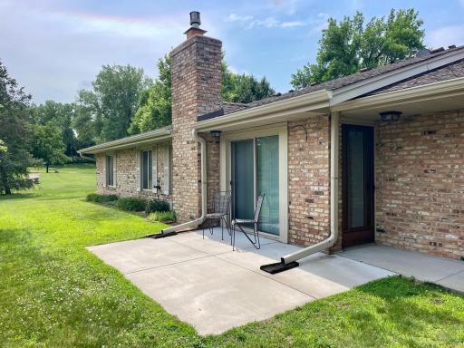 New cement patio off the living room and front door entrance!