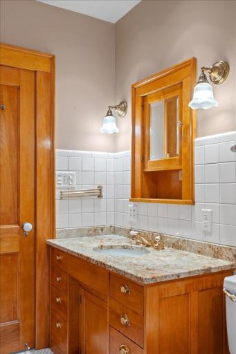 Granite, maple, and high end fixtures here.
