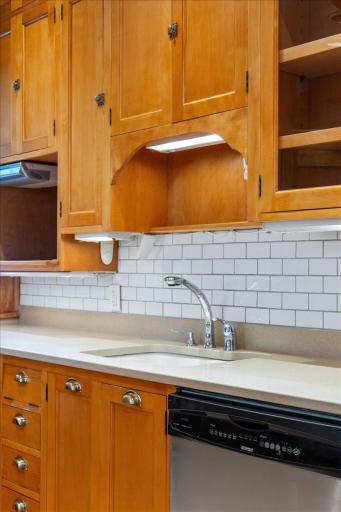 Corian top, and gorgeous tiled backsplash.