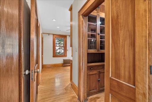 Between kitchen and dining room; butler's pantry!