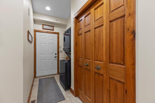 Double closets, laundry area, door leading to garage