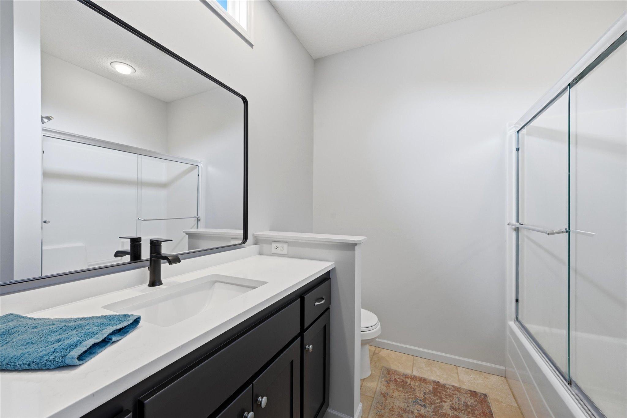 Guest bathroom on upper level