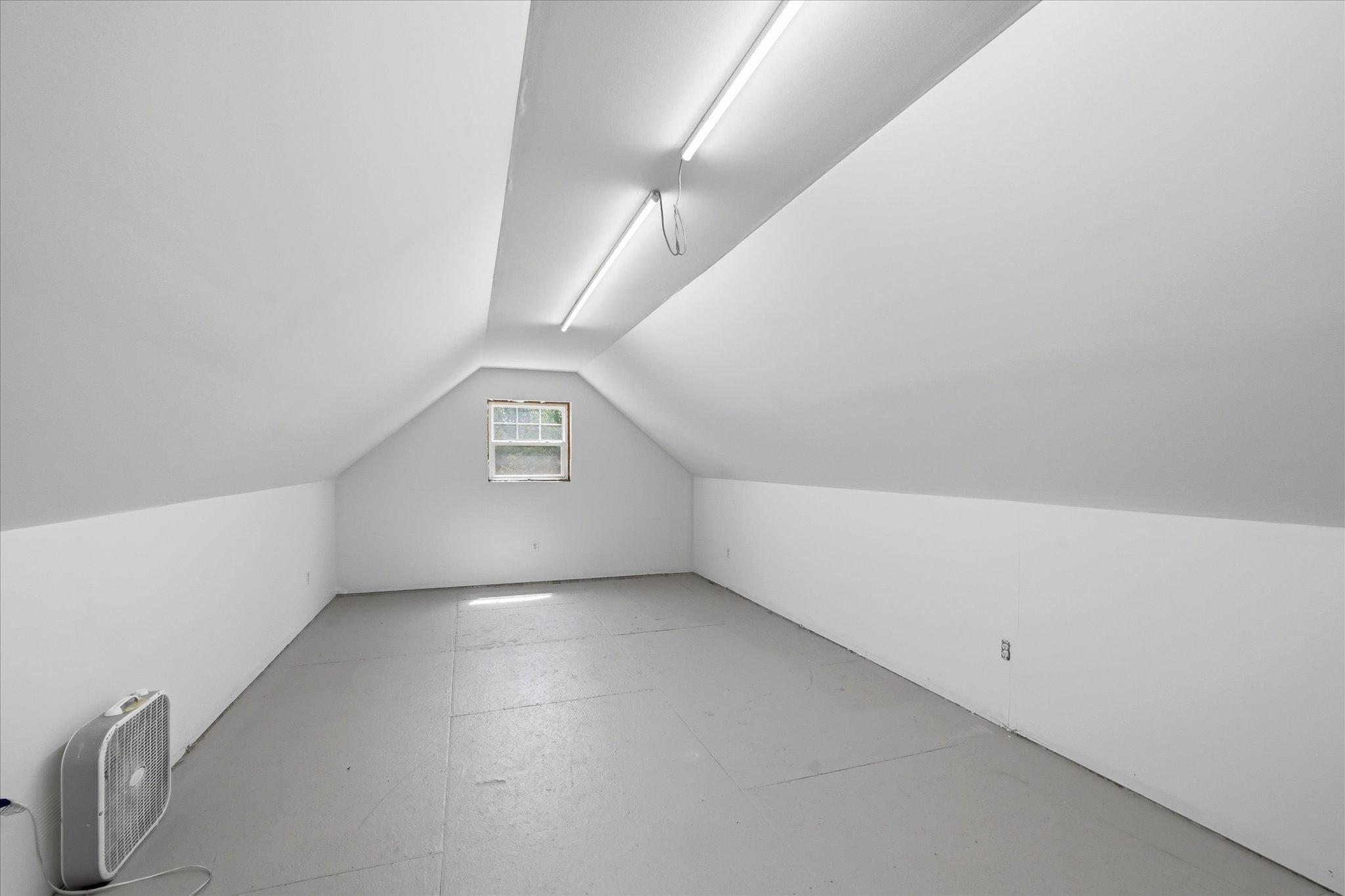 Another view of the room above detached garage/shop