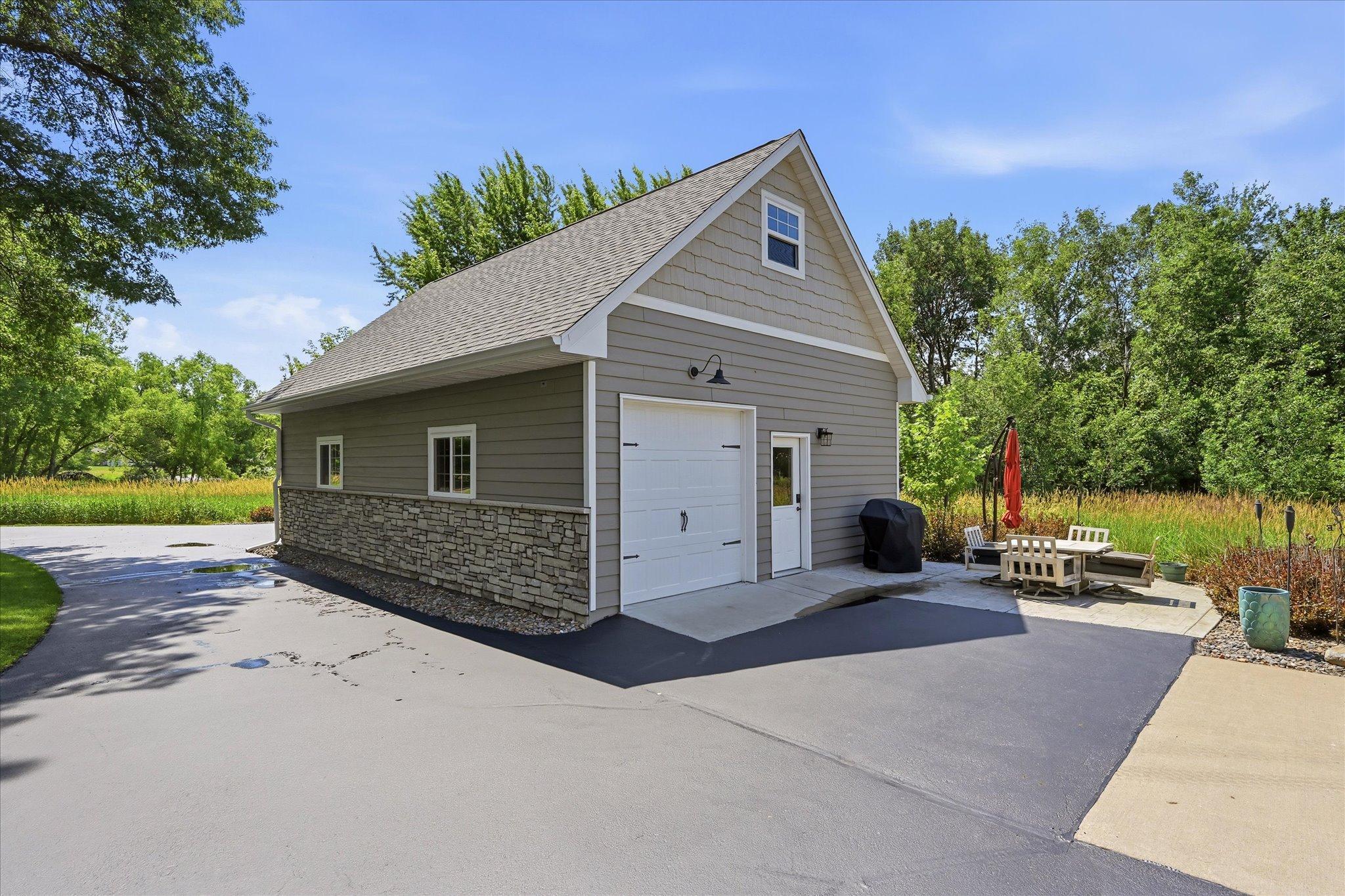 Garage has doors on both sides for easy drive through access!