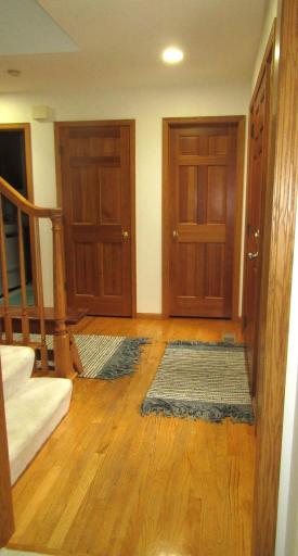 Spacious front entry looking from the living room into the entry.