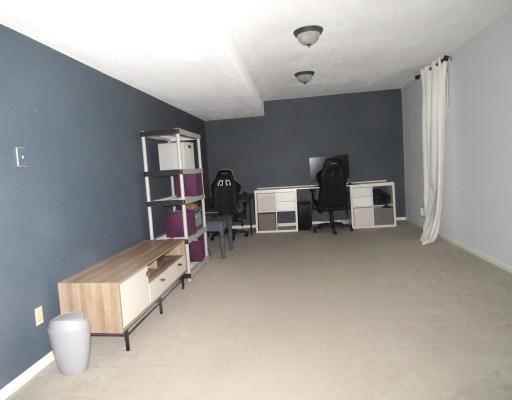 This room is perfect for a media room, game room or play room.