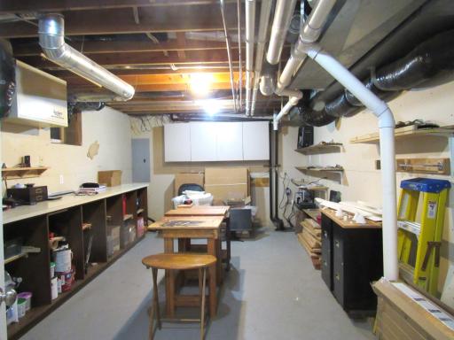 Huge work shop/craft room. There is 150 AMP service, a sump pump, a back-up system and a radon system.
The furnace is 3-1/2 years old with an air exchanger.