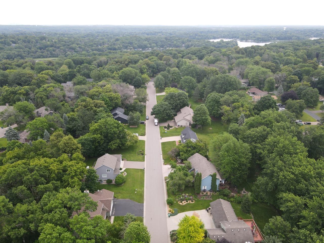 Beautiful view of the neighborhood and lake. Carver Beach Park is on Lotus Lake and there are several playgrounds in close proximity of the home.