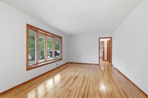 Beautifully refinished floors complemented by abundant natural light