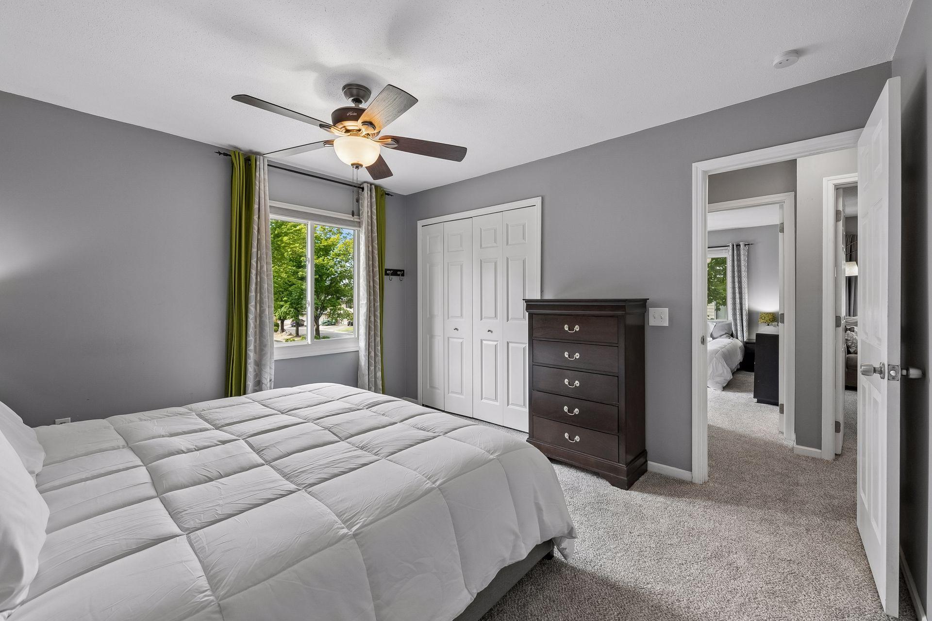 Primary Bedroom with Hunter Ceiling Fan for added comfort