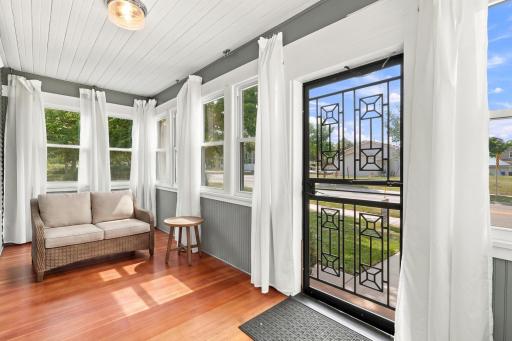 Front Four Season Porch Virtually staged.jpg