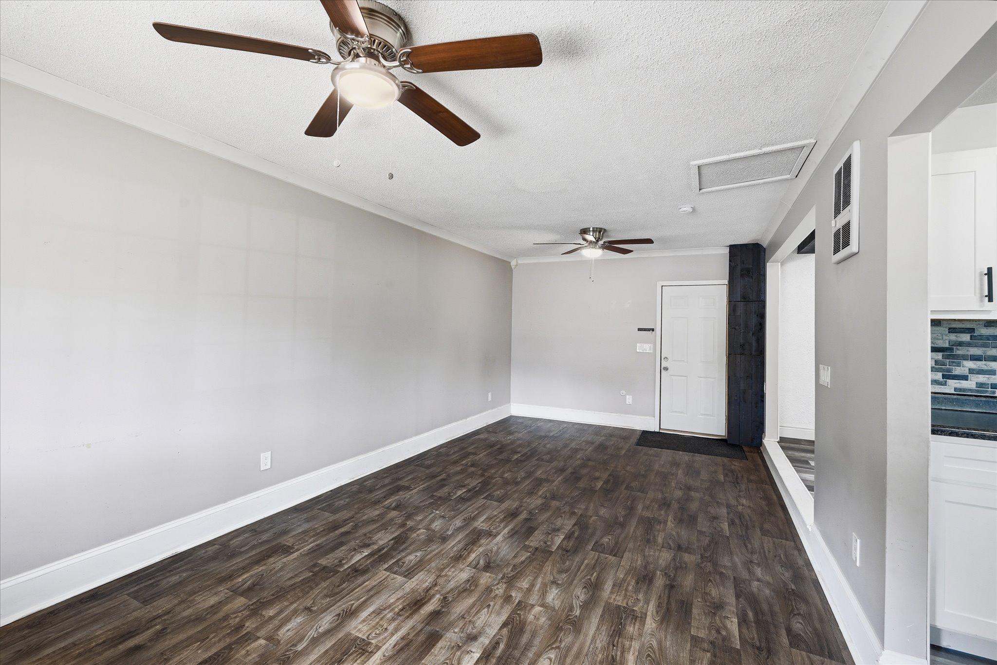 Living Room - Backdoor to the Backyard and Garage