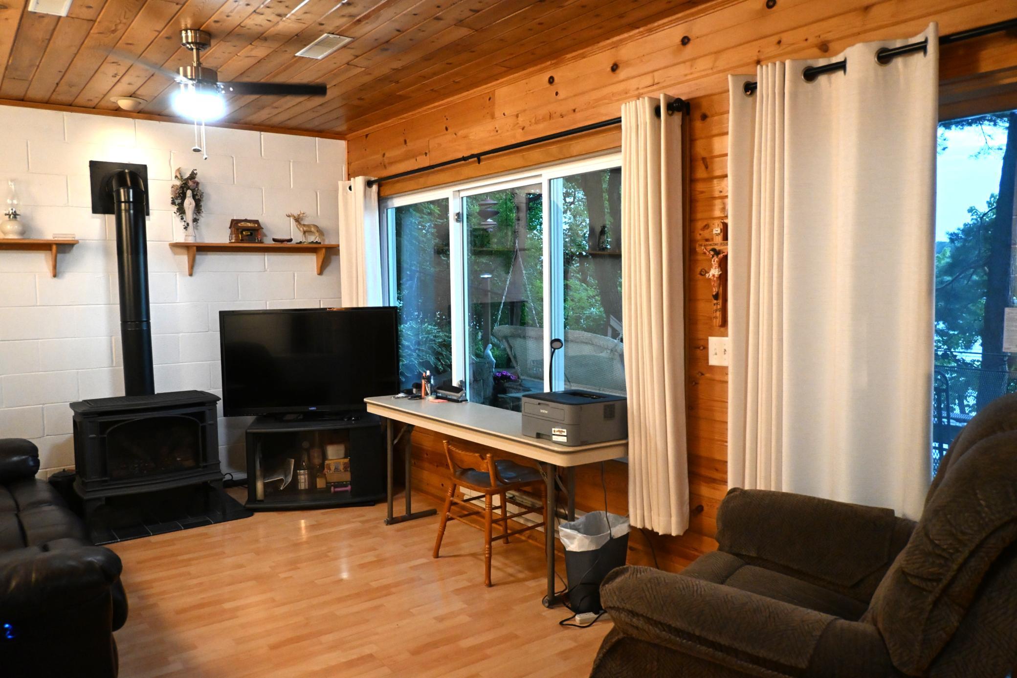 Lower level family room overlooking the lake.JPG