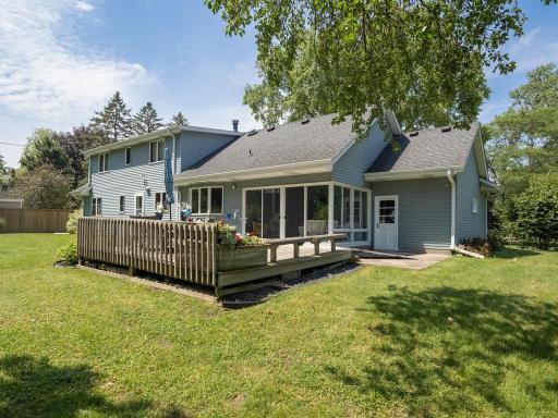 Spacious east facing deck with planters is 20ftx18ft! ! Easy access to deck/patio from cozy 3-season porch which is adjacent to dining room/kitchen.