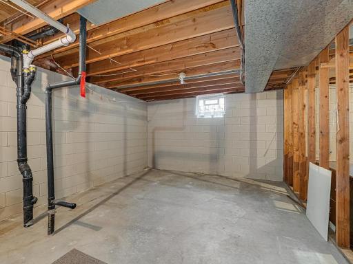 Right side of unfinished basement as you walk into furnace /laundry room. Stub-in plumbing ready to add 3rd bathroom.