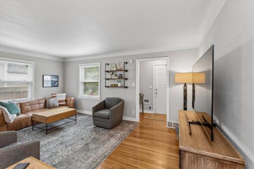 Classic hardwood floors, abundant natural light, and a comfortable layout make this space feel like home.