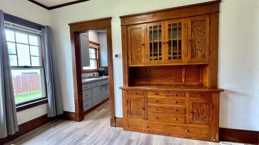 Dining room with kitchen behind.
