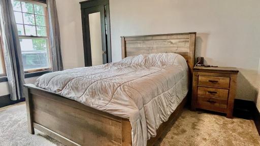 Primary bedroom with walk-in closet.