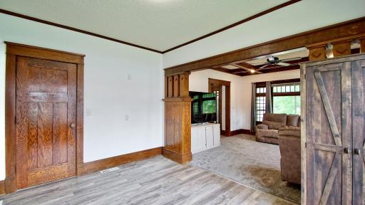 Dining room. Door on left leads to main level full bath and 2 bedrooms.
