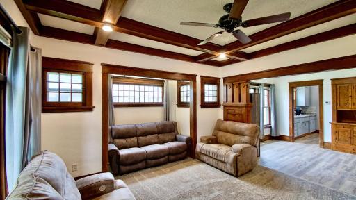 Living room with dining room and kitchen to the right.