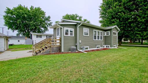 Left side view of home. New mulch surrounding property. Nice flat yard.