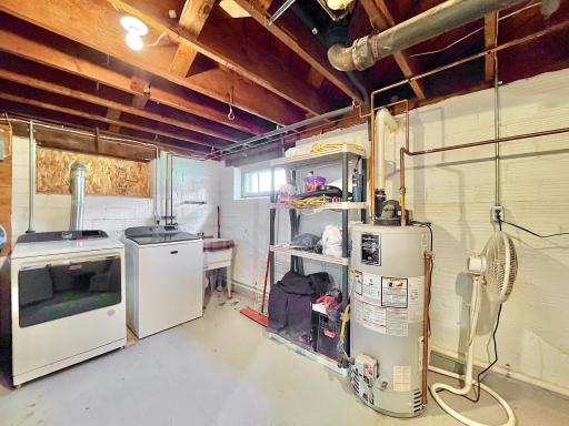 Laundry room on the lower level. New washer and dryer in 2022.