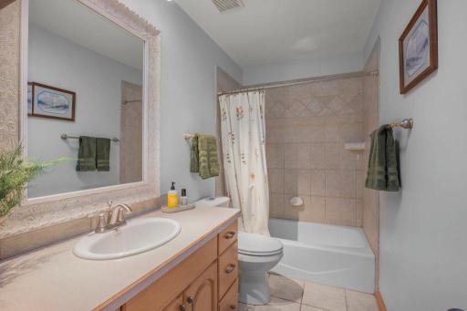 Full Bathroom upstairs w/ solar tube offers lots of natural daylight