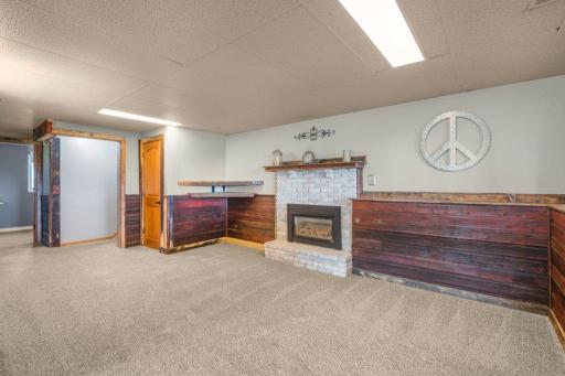 Such a cozy family room w/ a toasty gas fireplace