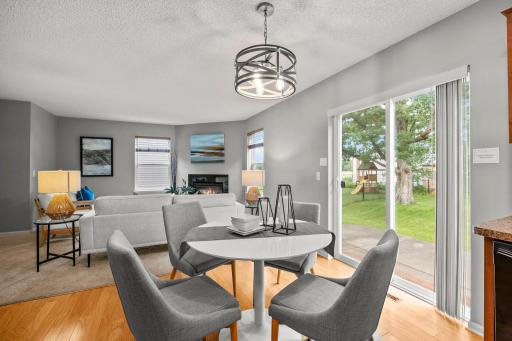 From here, step directly out to the back patio, perfect for enjoying meals or relaxing outdoors.