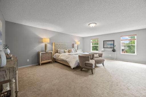 Situated upstairs are three well-sized bedrooms, including the primary suite.