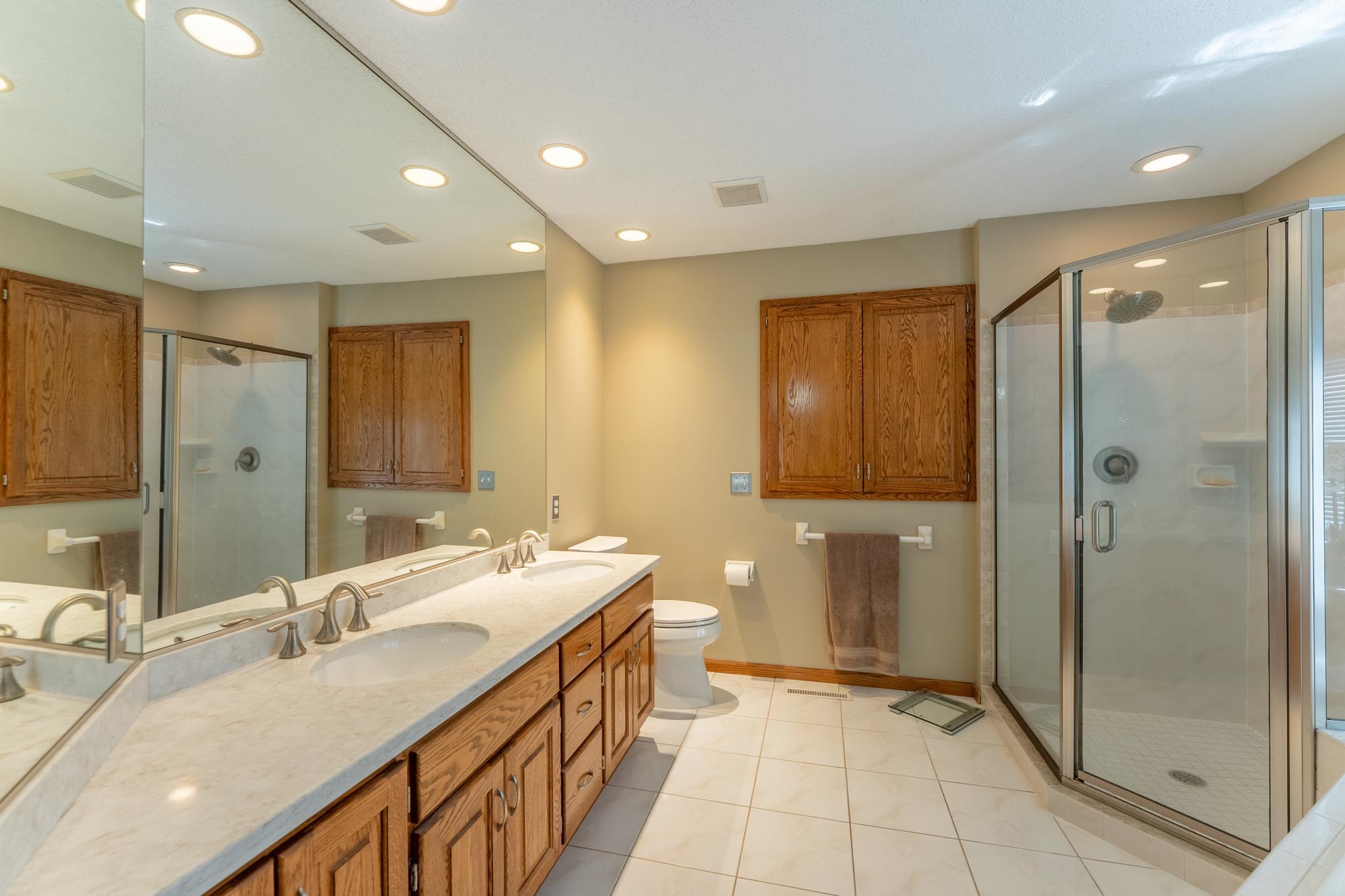 Owner's bath has a soaking tub, separate shower and dual vanities.