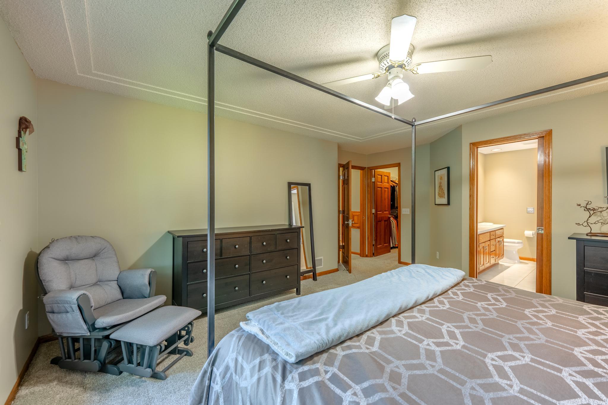 This bedroom boasts a large walk in closet and private bath.