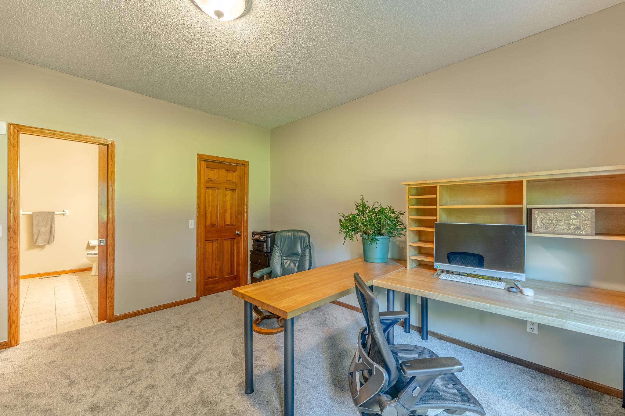The 4th bedroom has a walk in closet (door to the right) and walks through the the adjoining full bath.
