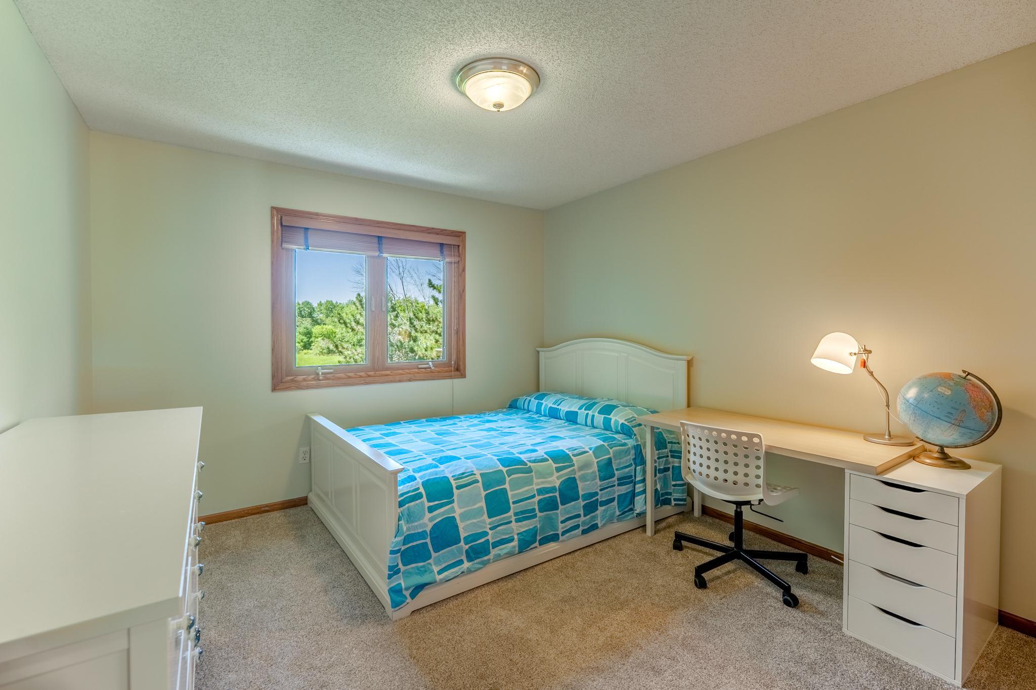 Bedroom 2 on the upper level.