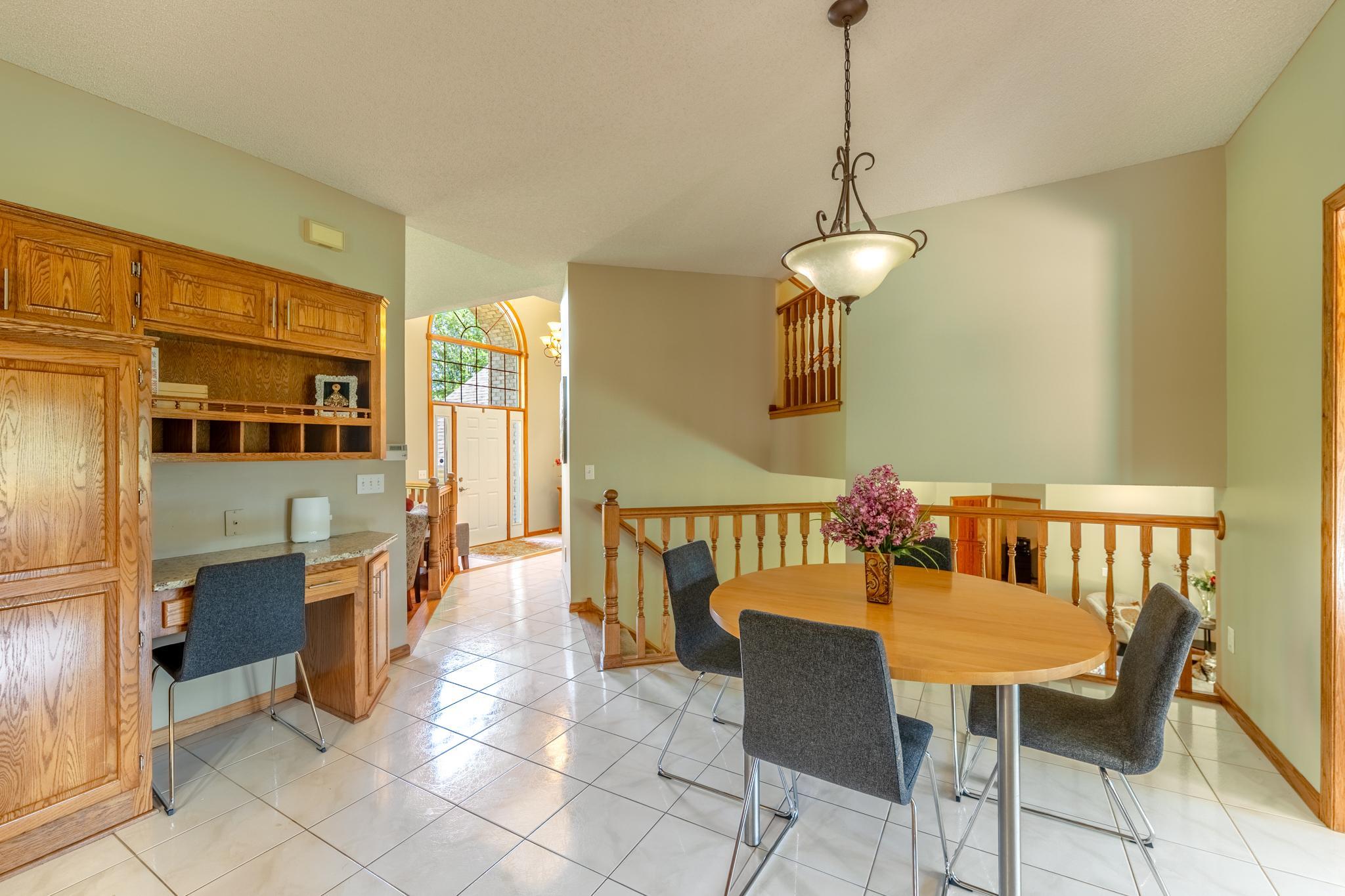 A few steps down from the kitchen and breakfast area is the family room.