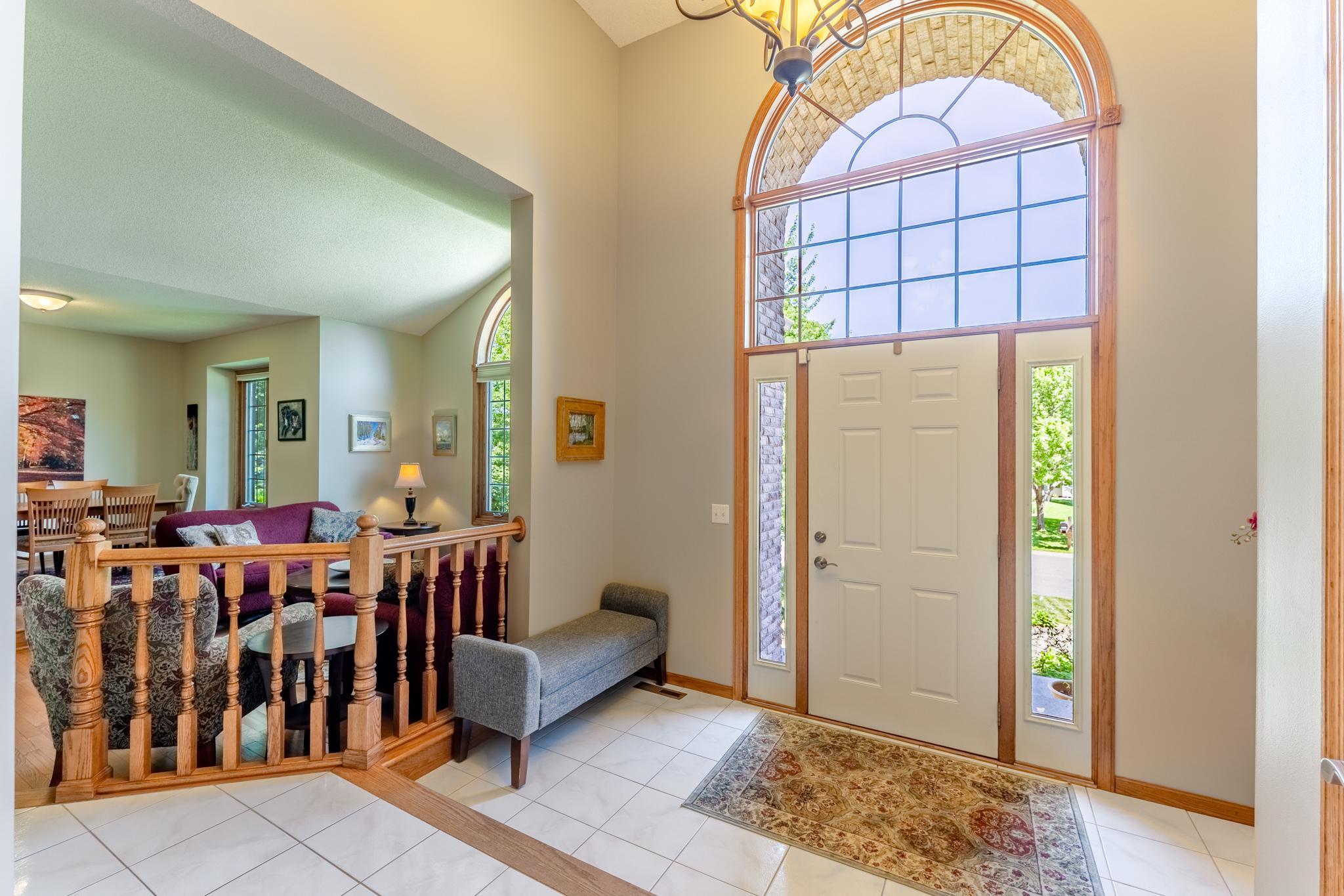 Two-story foyer welcomes friends and relatives alike.