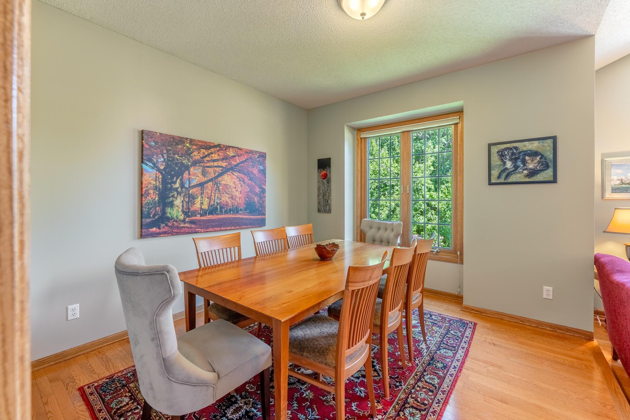 The formal dining room sits adjacent to the kitchen and offers plenty of space for a large, extended table, perfect for hosting family or friends.