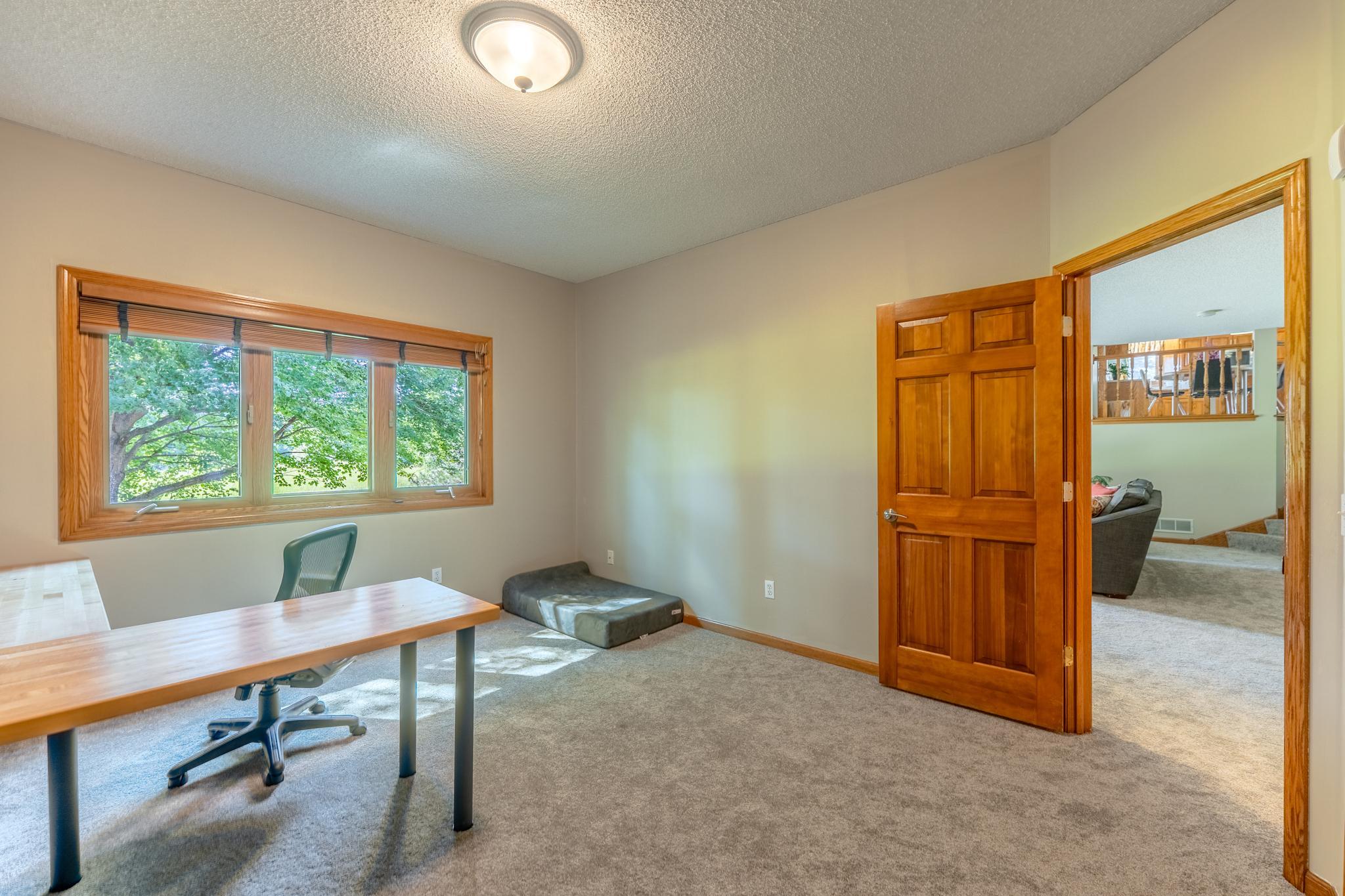 Adjoining the family room is the 4th bedroom. Currently being used as an office, but it is large enough for a king bed, and also has new carpet and fresh paint.