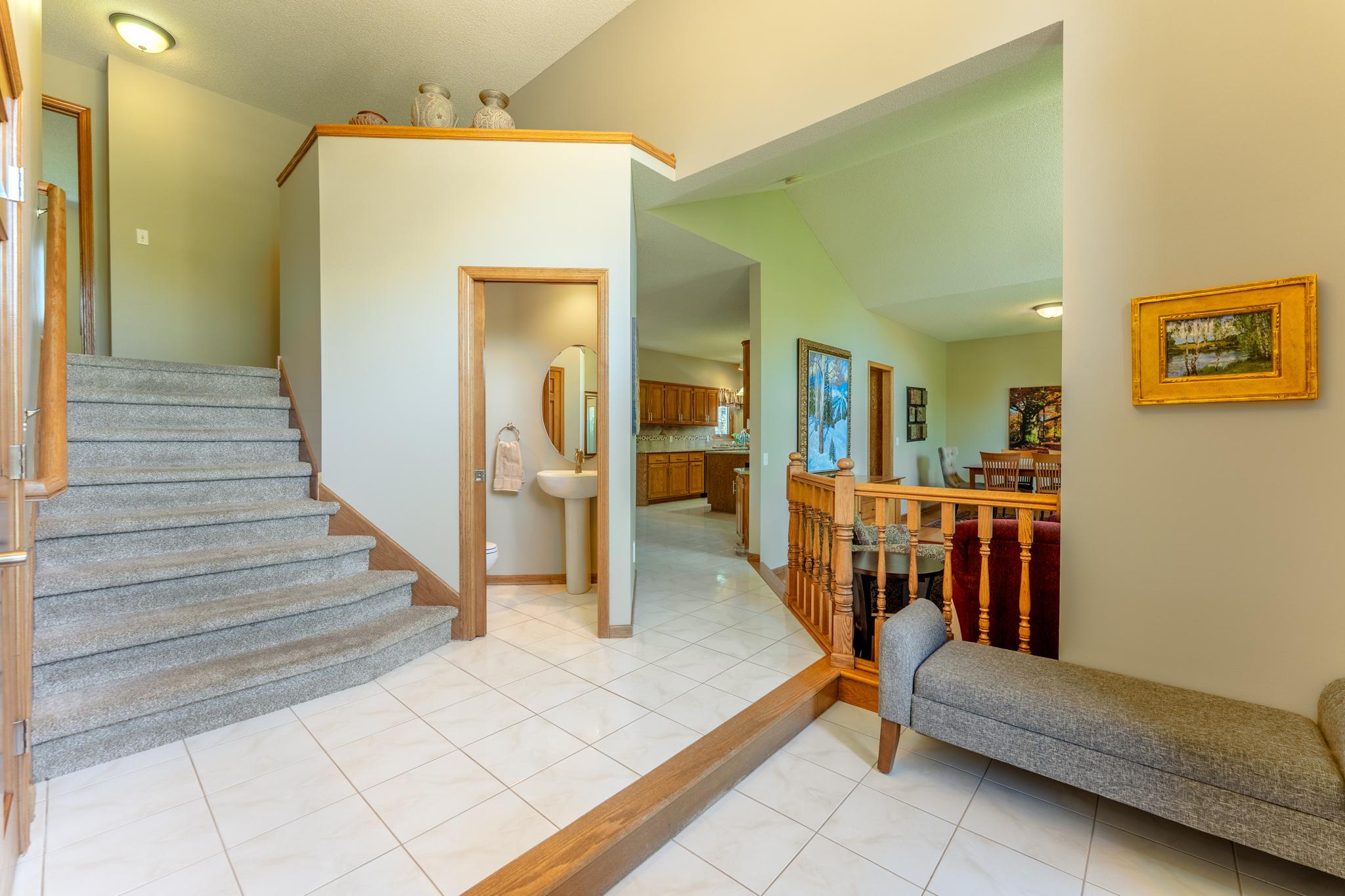 Back inside the home, the half bath is conveniently located on the main floor.