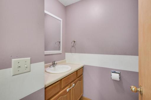 Convenient main-level half bathroom for guests.