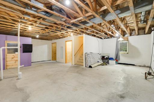 Expansive unfinished basement with endless potential.