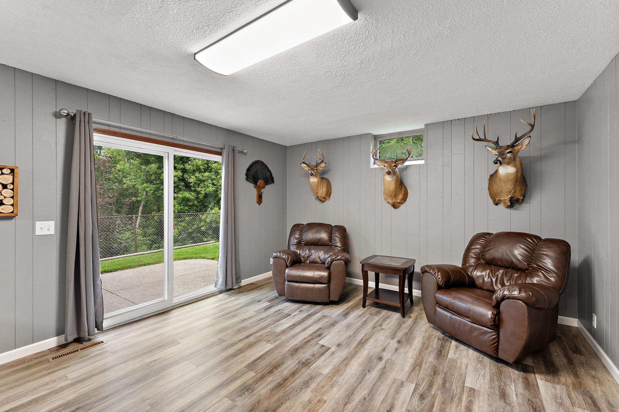 Lower level family room walks out to private back yard