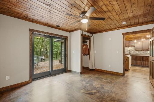 Second bedroom with private access to the rear deck and backyard.
