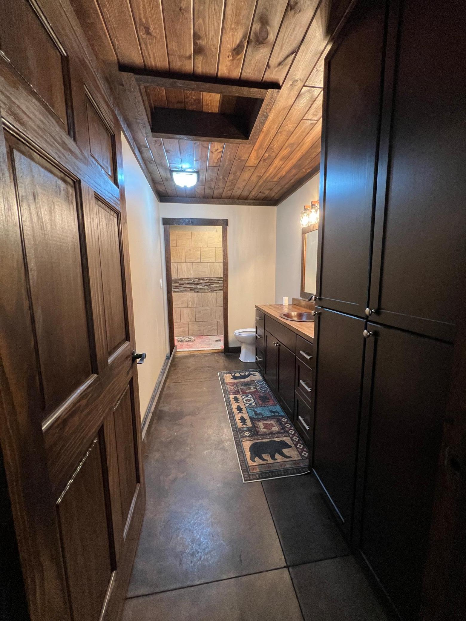 Spacious 3/4 bath with custom tiled walk-in shower