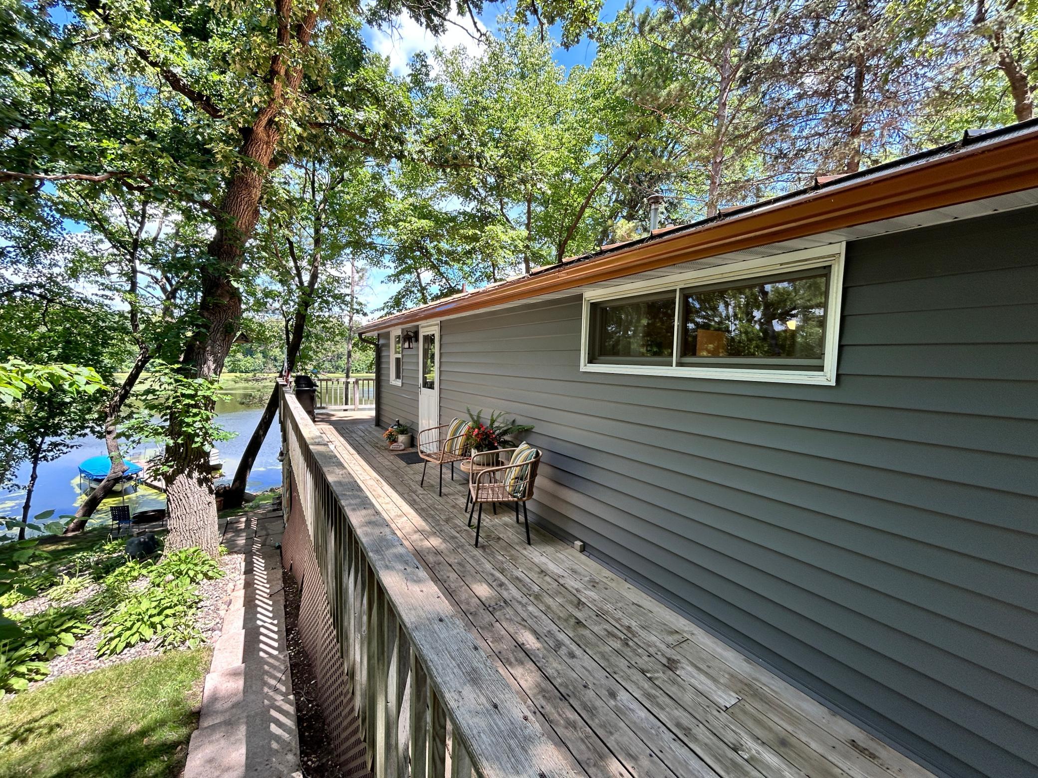 Wrap around deck provides access to the main entry.