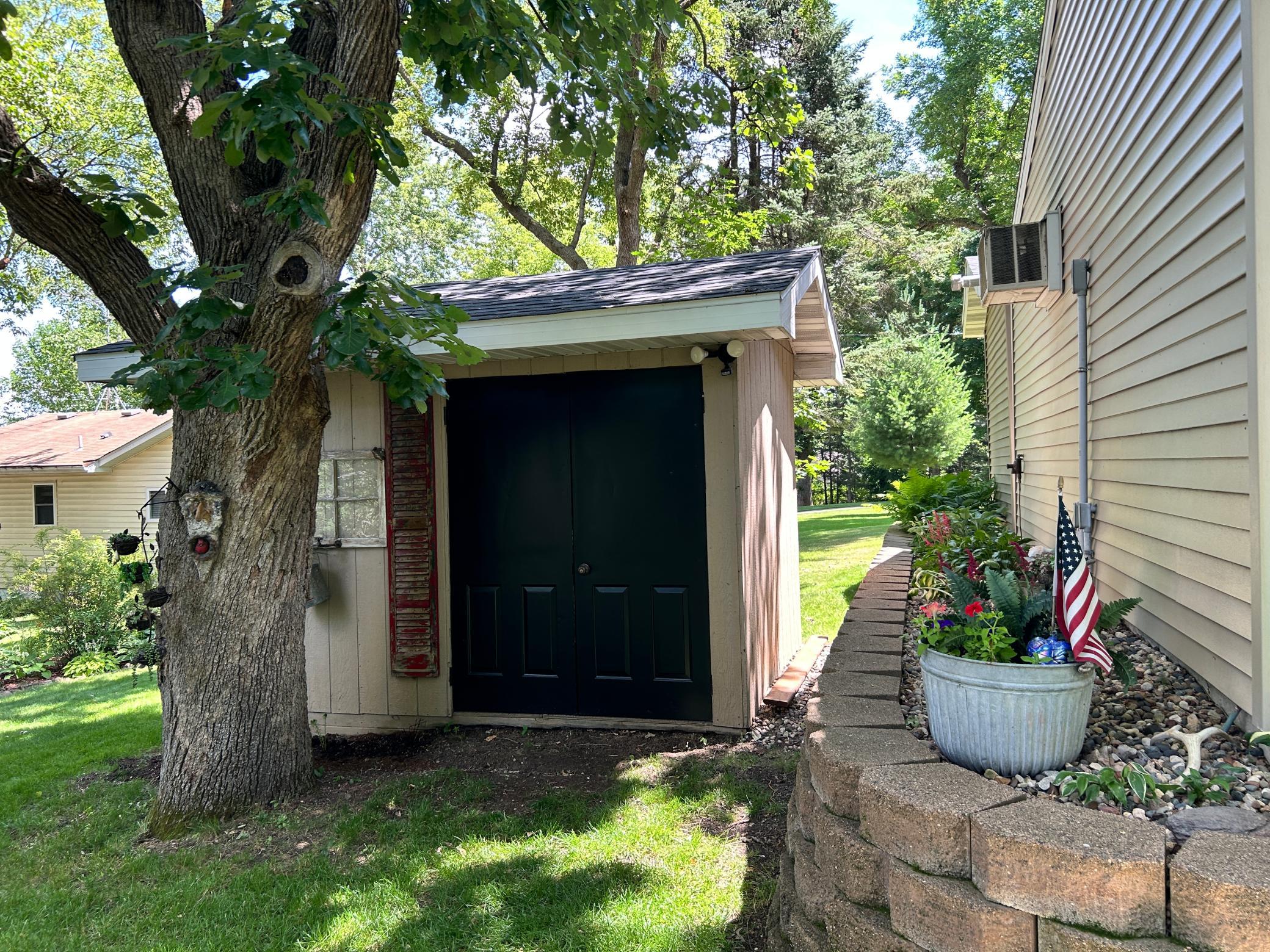 The second storage shed perfect for your gardening supplies.