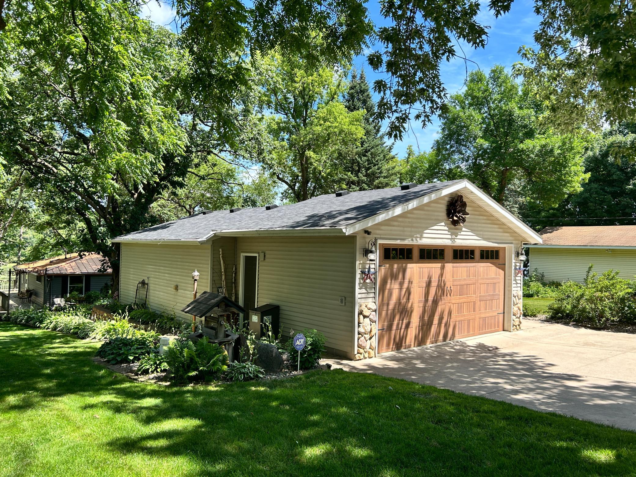 Great 22 x 40 double garage that is insulated finished and heated offering you plenty of extra space for storage, hobbies, or gardening. The entry to the garage is a full oversized concrete driveway to the road.